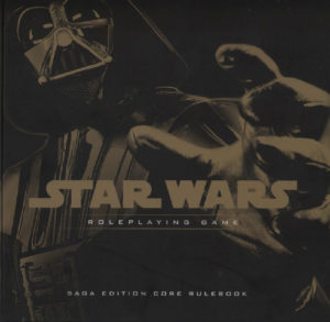 Darth Vader reaches out from the cover of the Saga Edition rulebook. 