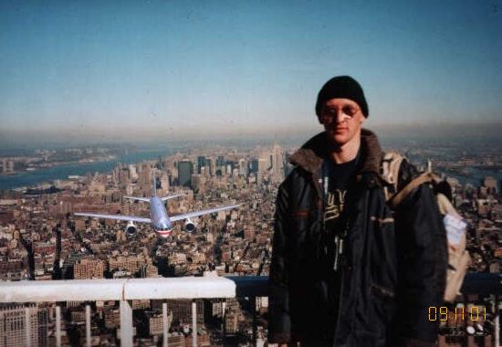 A photo of a plane approaching from behind a man allegedly standing on top of one of the World Trade Center towers