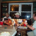 A group of male gamer gather to play D&D.