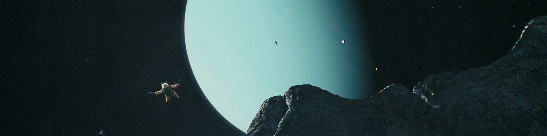 Explorers jump from cliffs on a moon of Uranus. The blue gas giant rises in the background.