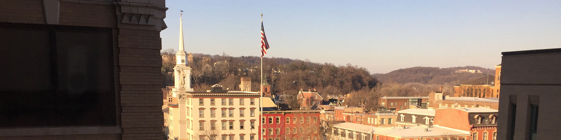 A view of the cityscape of Easton. A blue sky appears overhead.