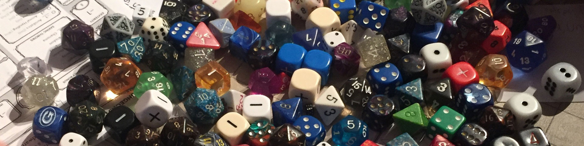 A close-up view of various polyhedral dice.