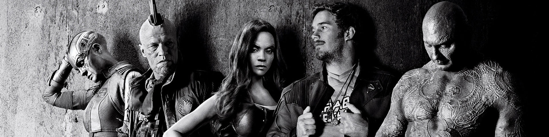 A black and white photo of the Guardians of the Galaxy standing against a wall.