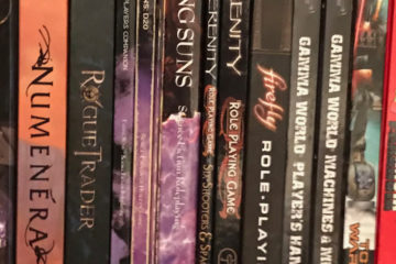 A view of two dozen role-playing game books.