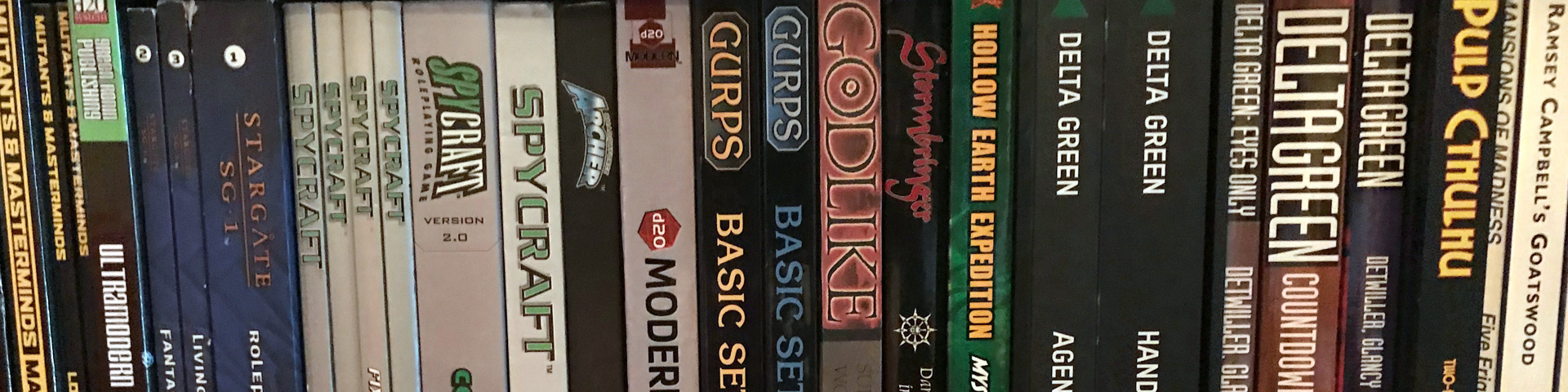 A close up view of the spines of numerous role-playing game books.