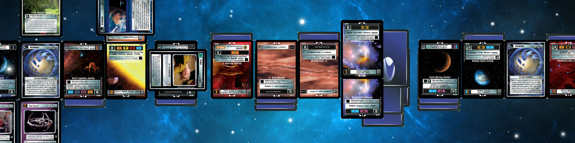 Star Trek game cards laid out on a blue/black starscape.