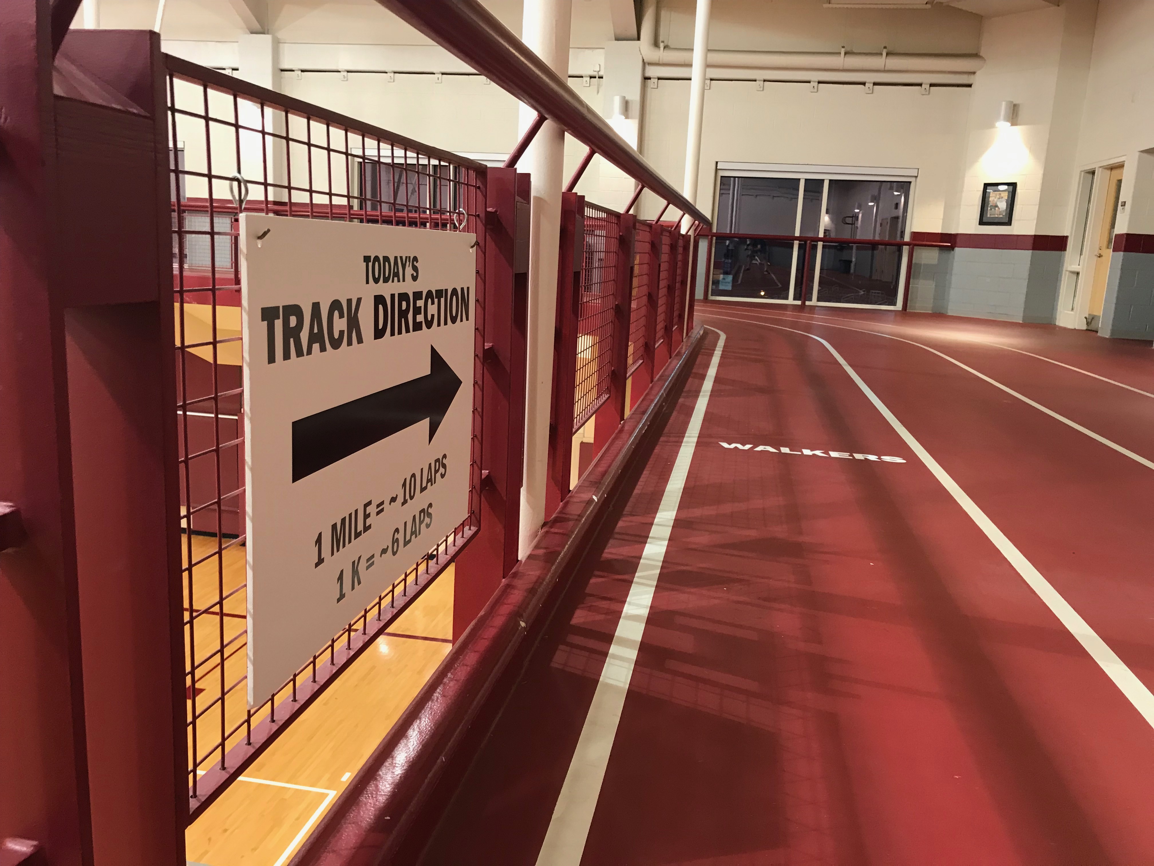 An indoor track with the "today's direction" sign.