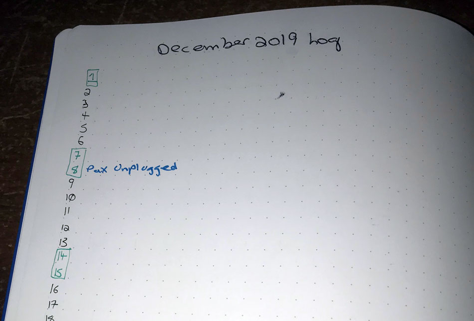 A month bullet journal view. Dates are listed down the left margin, with blue text indicating family/home events. Weekends/holiday dates are green