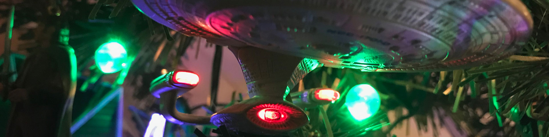 The Star Trek Enterprise 1701-D, illluminated by Christmas tree lights.