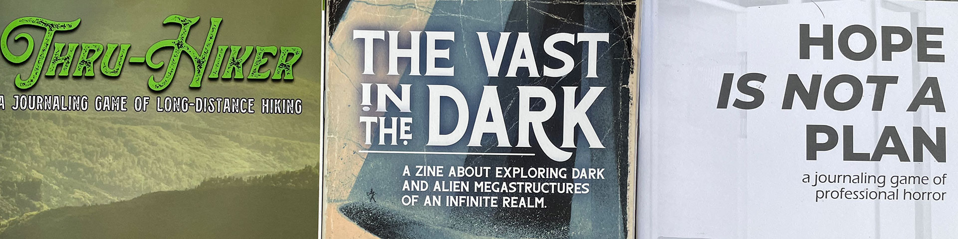 Cover Art for Thru-Hiker, The Vast in the Dark, and Hope Is Not A Plan