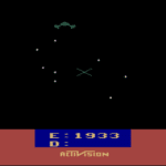 A dogfight with an enemy. White stars appear on a black background. A green enemy starfighter appears in the upper left.