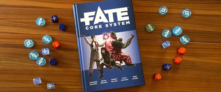 The Fate core rulebook surrounded by dice.